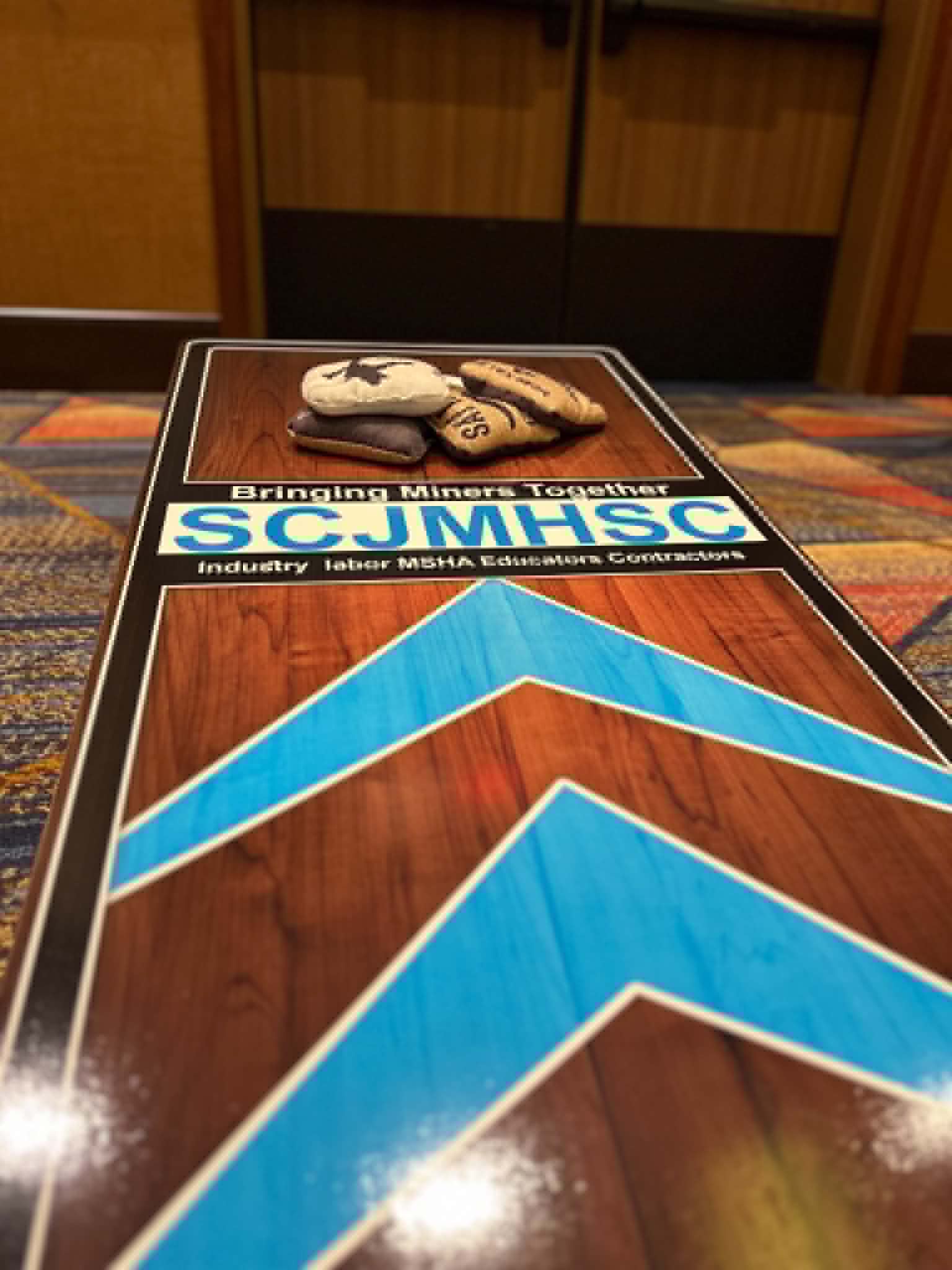A cornhole match underway between sessions at the 2026 conference